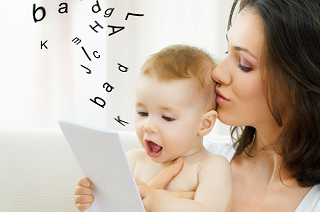 woman reading with a baby. Random letters are shown floating away into the air.